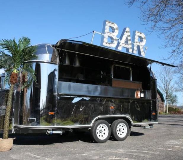Glossy black bar truck with BAR marquee letters